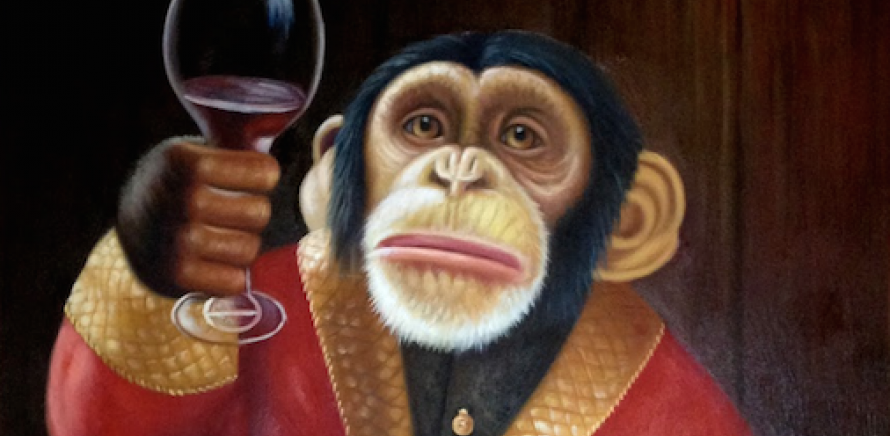 Monkey holding wine glass